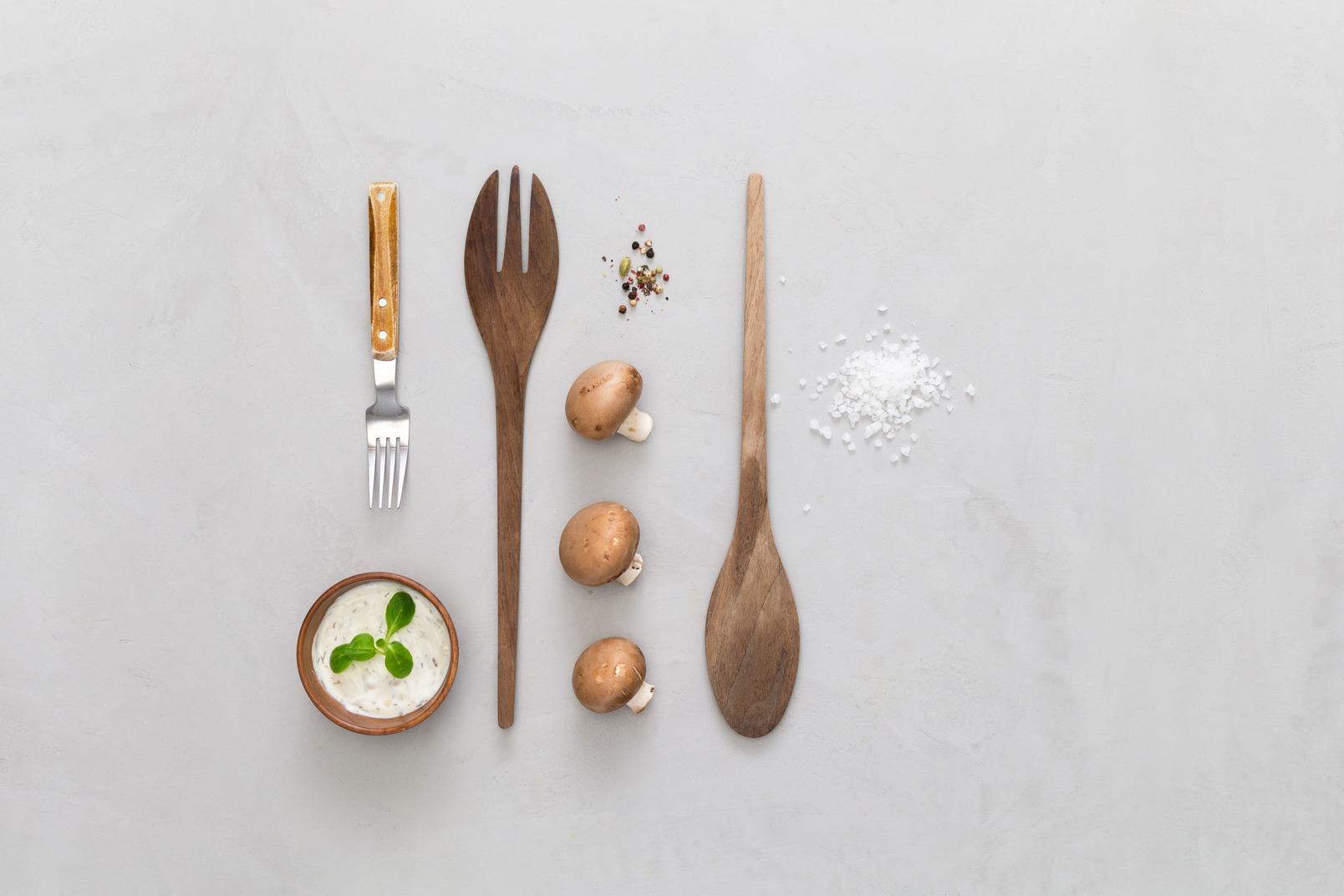 Wooden cutlery, mushrooms and spices
