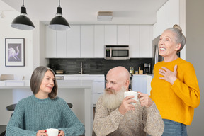 A group of people in the kitchen