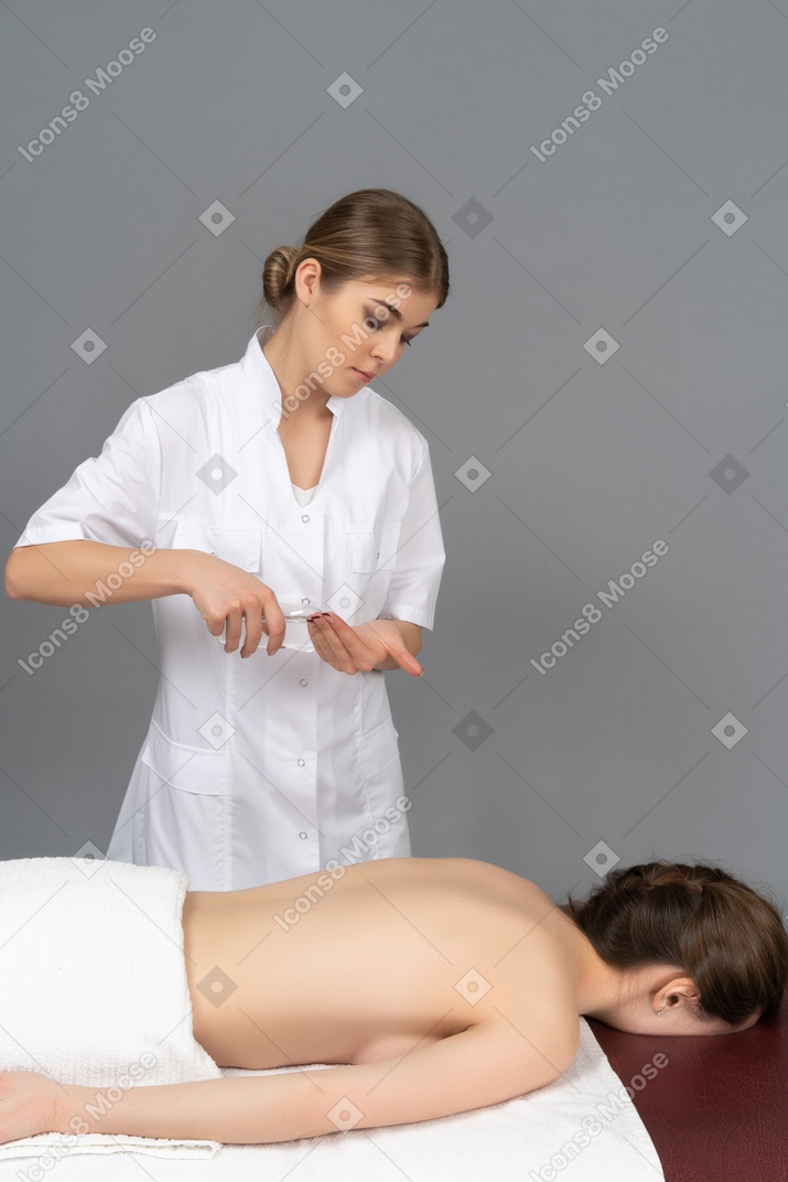 Applying a massage oil