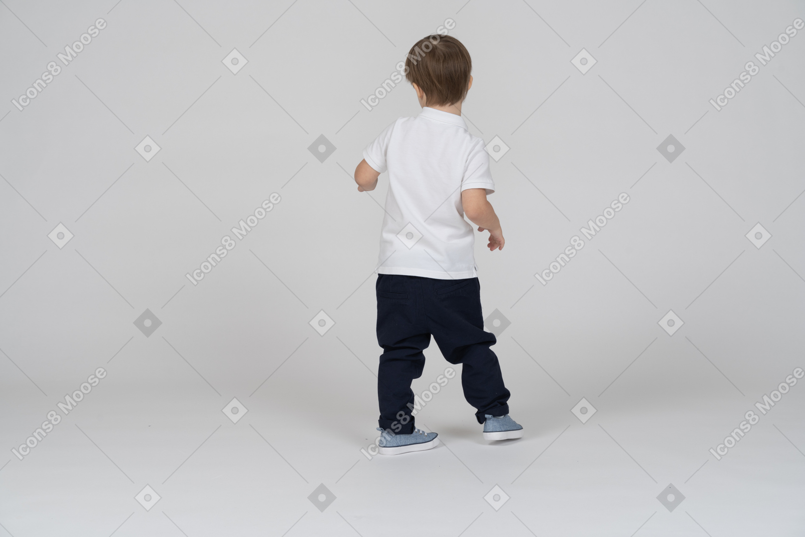 Back view of a boy stepping forward