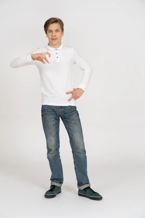 Young man in casual clothes standing