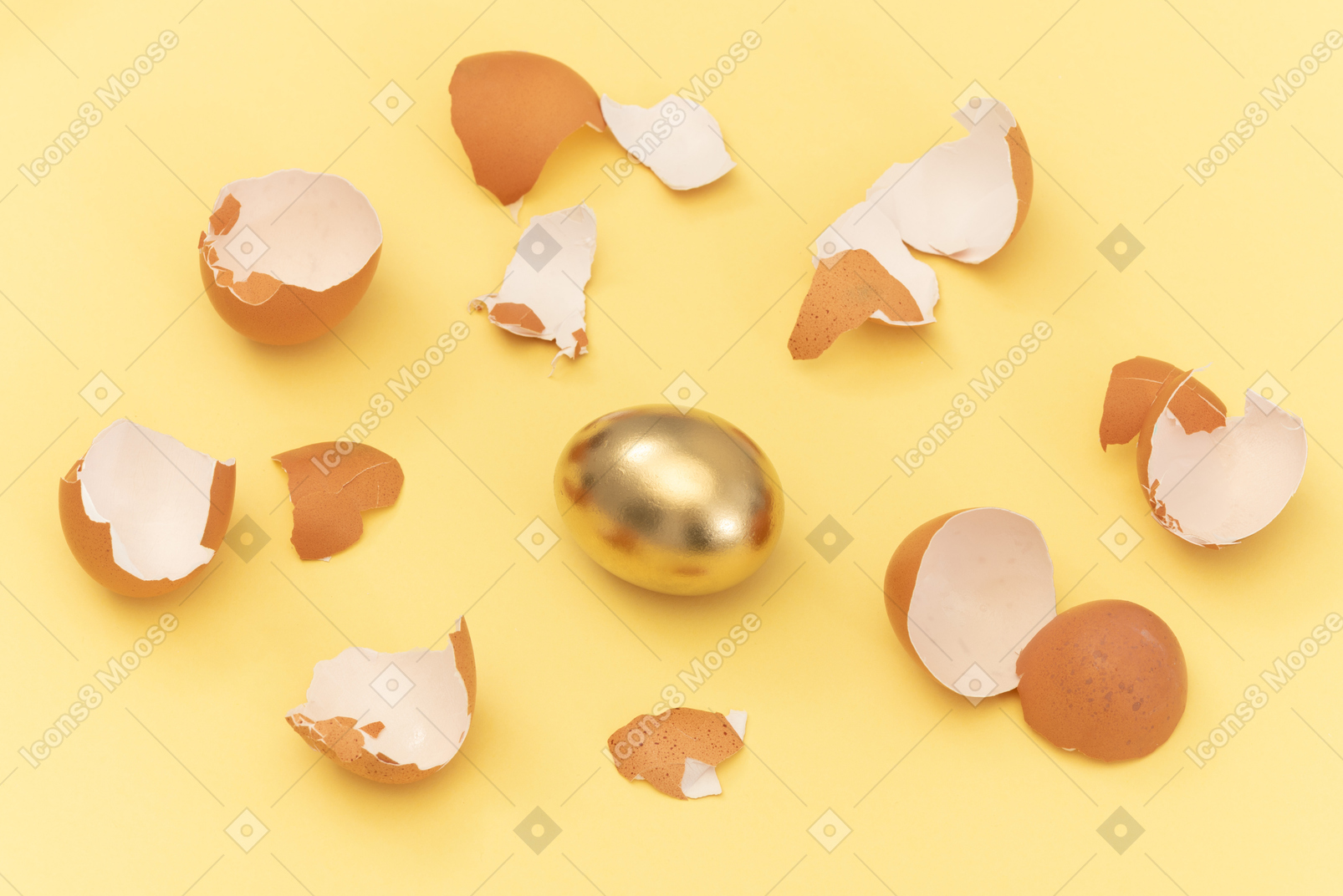 Golden egg among eggshells