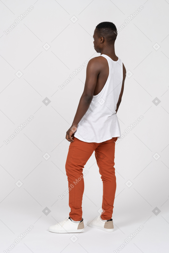Back view of black young man standing