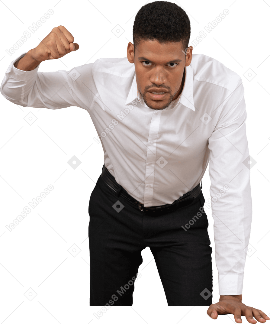 Angry man is ready to punch the table