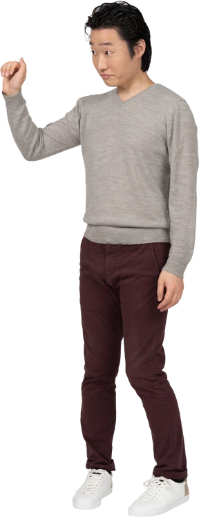 Man in casual clothes posing