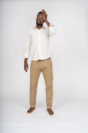 Man in white shirt standing