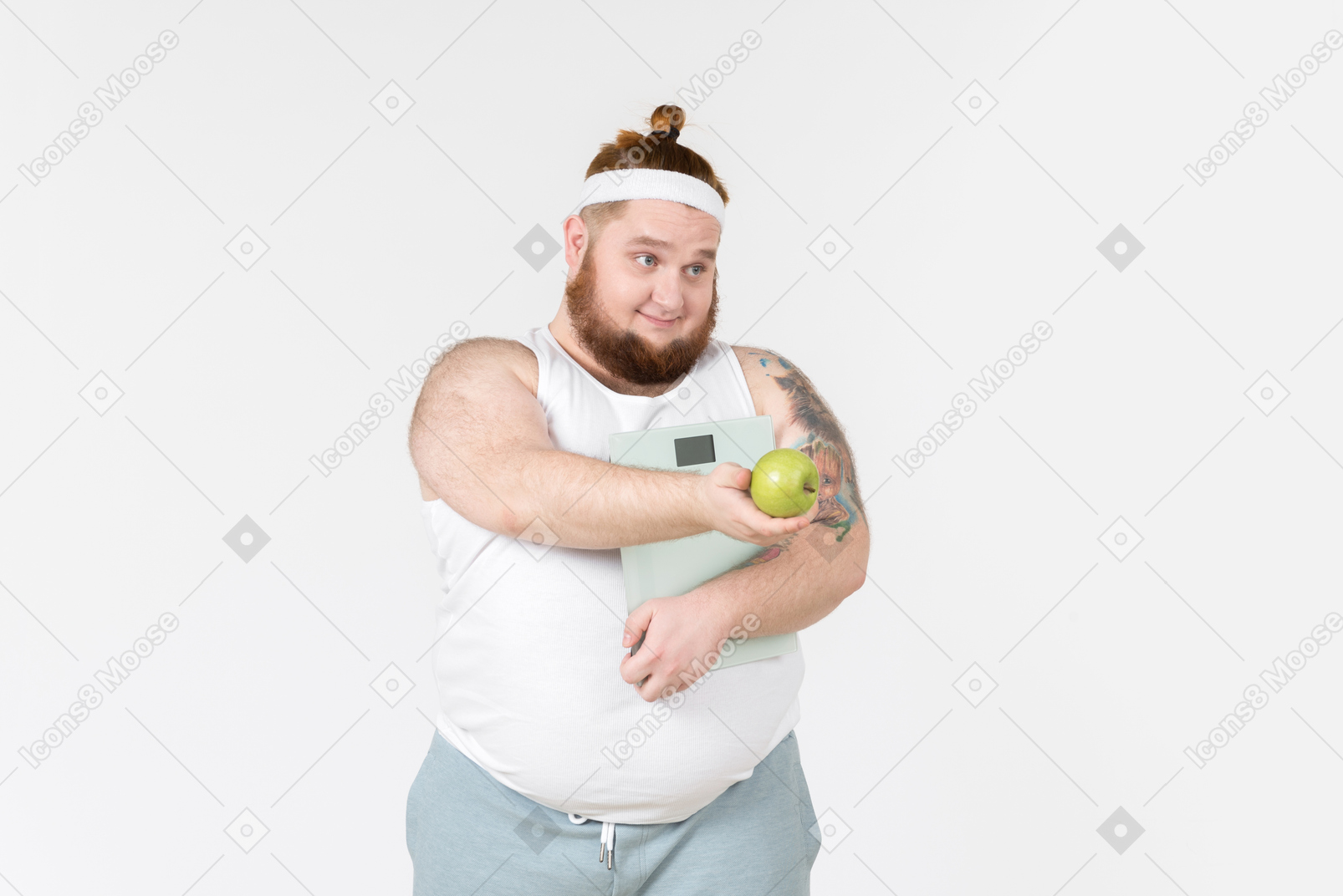 Big guy in sportswear holding digital weights and apple