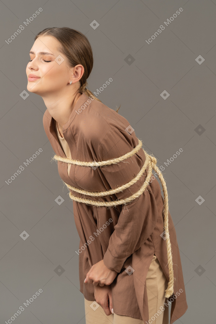 Bounded young woman in pain