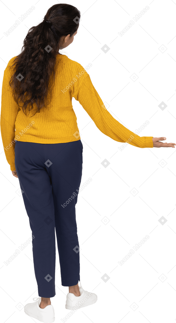 Back view of a girl in casual clothes making welcome gesture