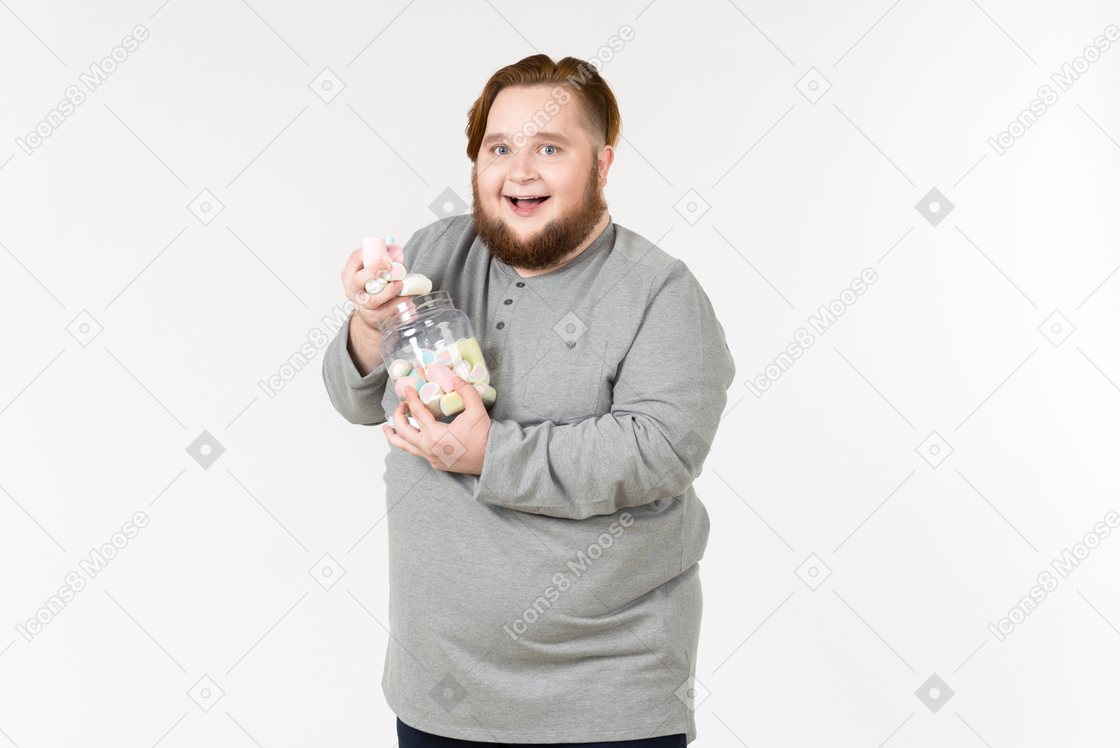 Big bearded guy eating marshmallows with eyes closed