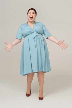 Happy woman in blue dress