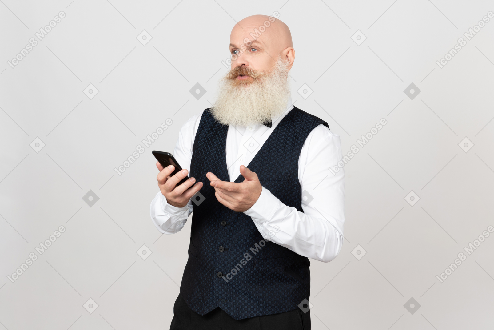Aged man holding phone and looking bothered with something