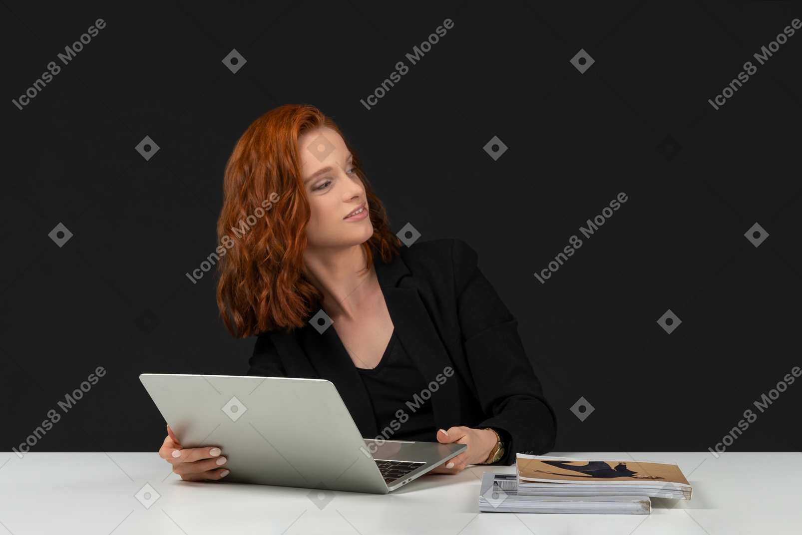 Cute business lady holding the laptop