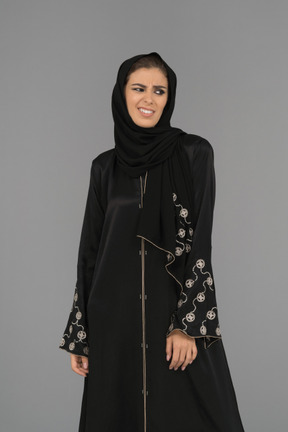Muslim woman looking skeptical