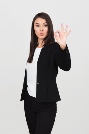 Business woman showing ok sign