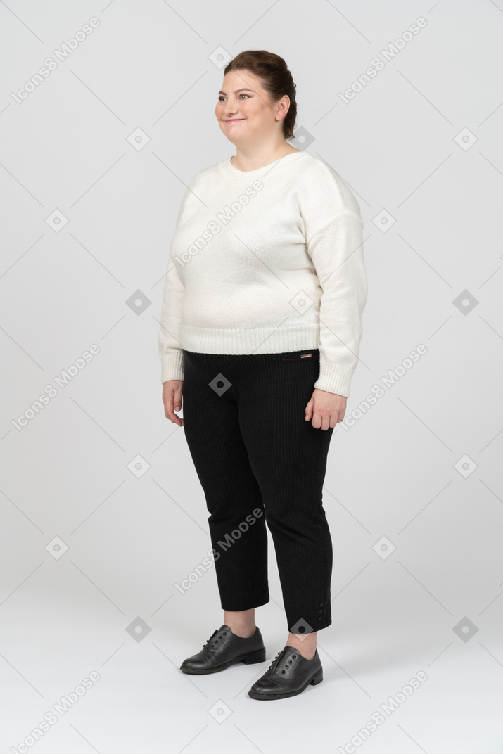 Happy plump woman in casual clothes