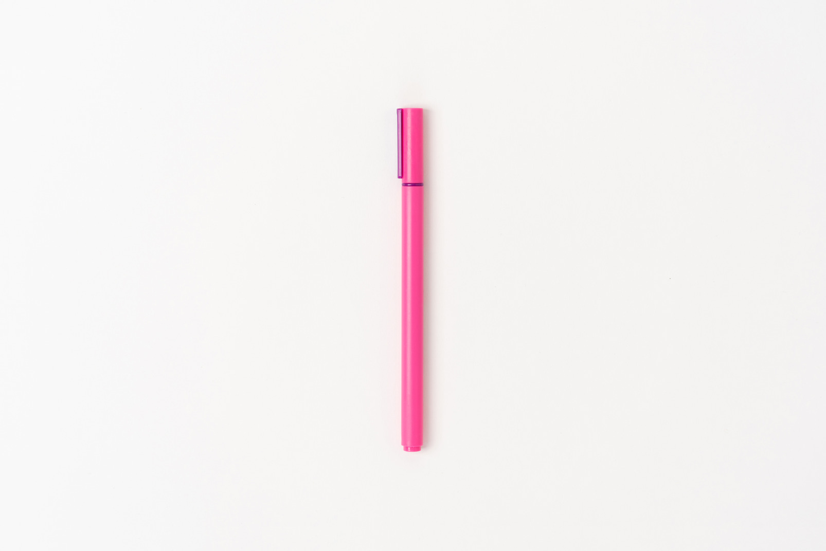 Pink marker pen on white background