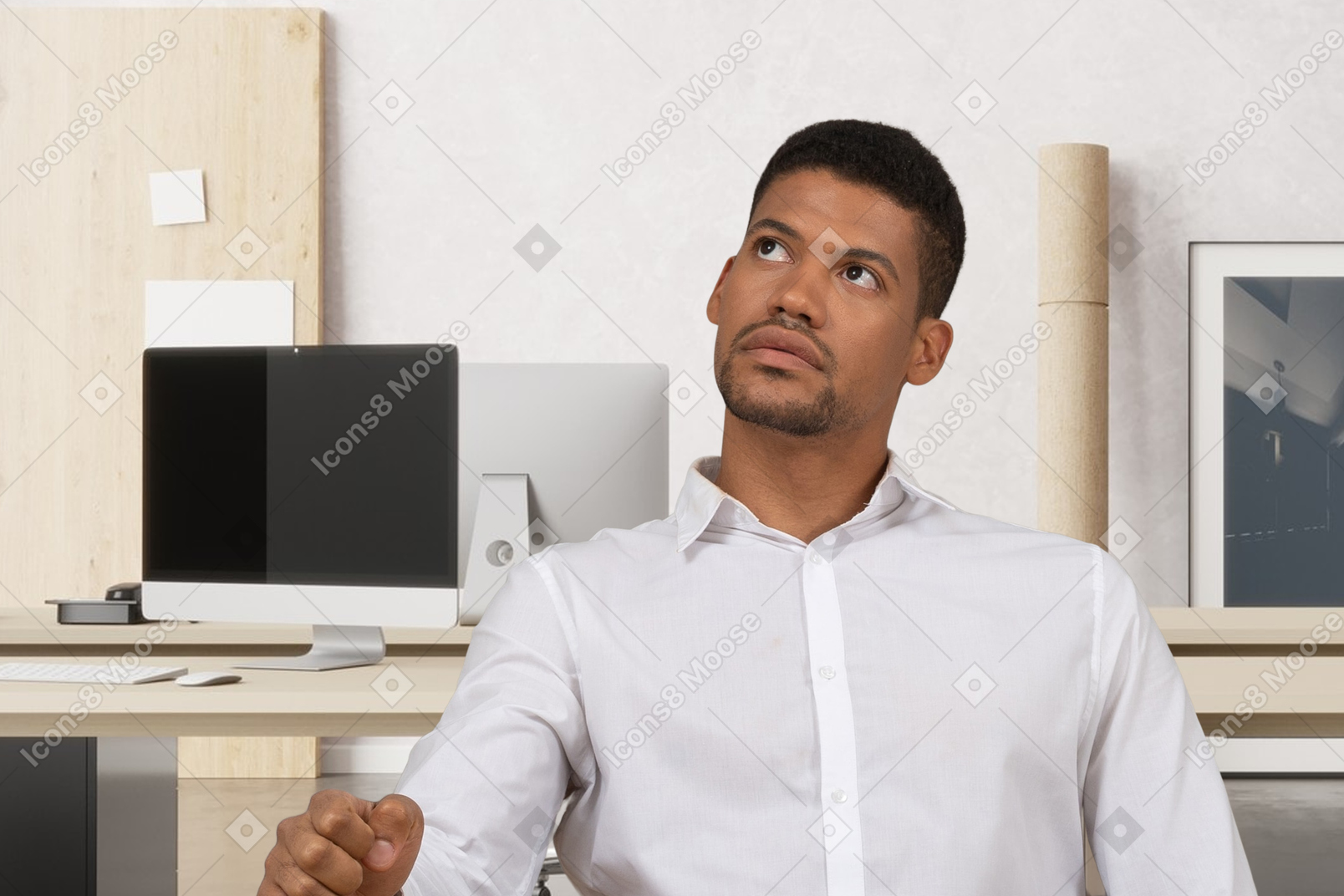 A thoughtful man sitting in the office