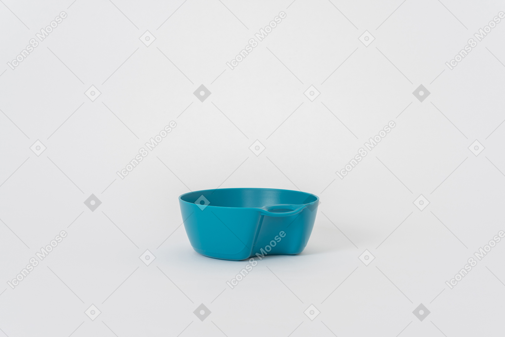 Plastic blue bowl on a white background