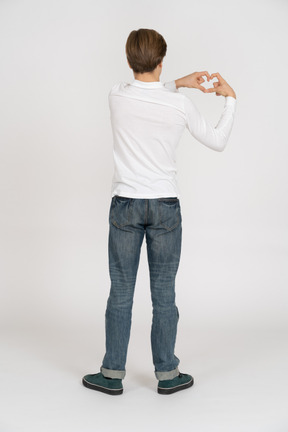 Young man in casual clothes standing