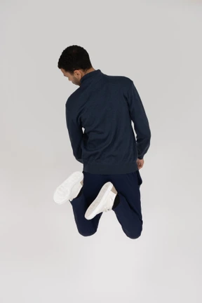 Man in black clothes jumping