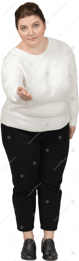 Plus size woman in casual clothes making welcoming gesture