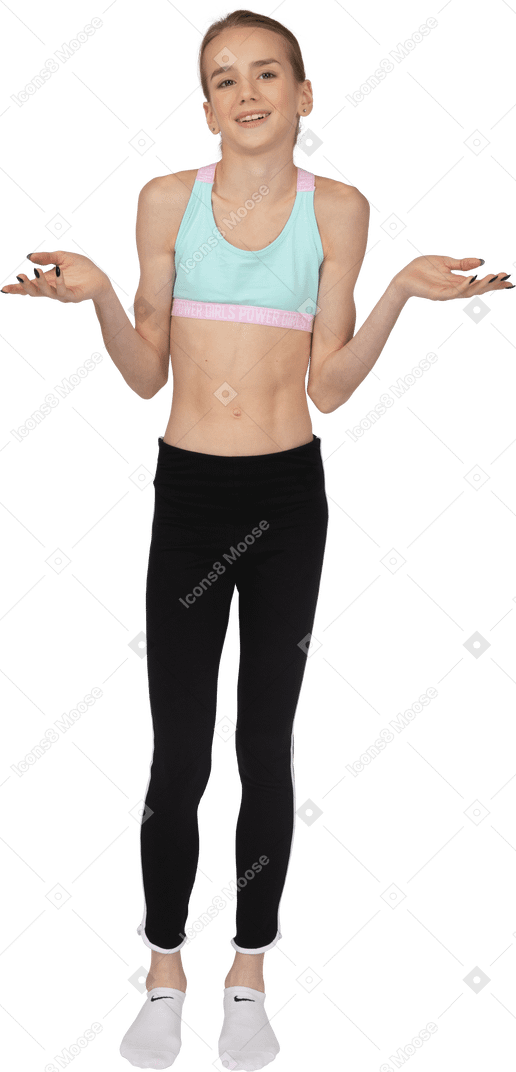 一个年轻的女孩，在运动服举手和微笑的前视图