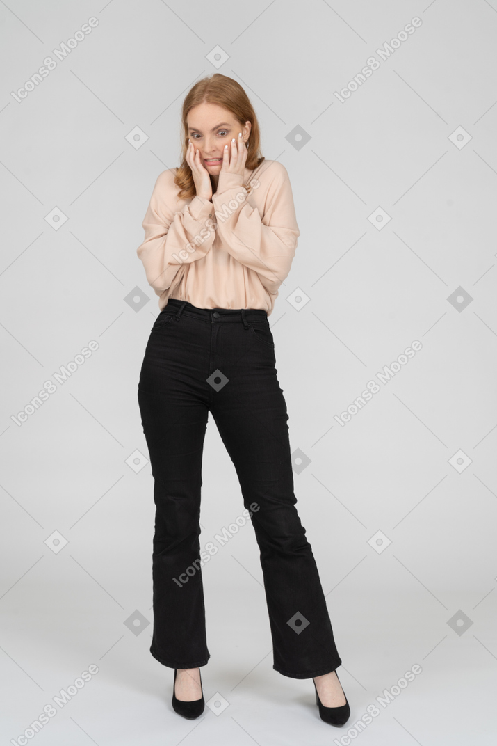 Woman in beautiful blouse standing