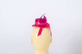 Pink hat on a mannequin head