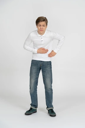 Young man in casual clothes standing