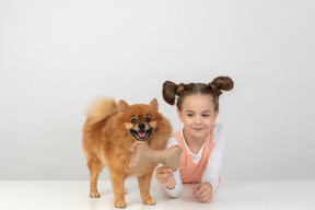 Girl and her little friend enjoying company