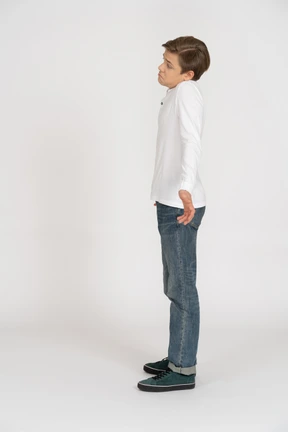 Young man in casual clothes standing