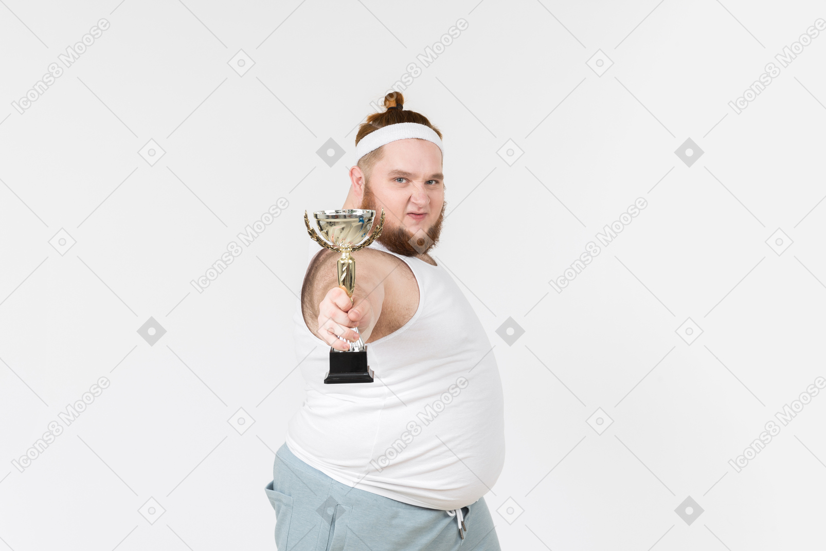 Big guy in sportswear holding trophy