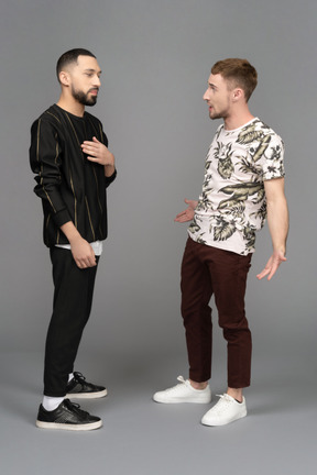 Two young men looking stressed from arguing