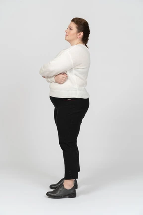 Plump woman in casul clothes standing
