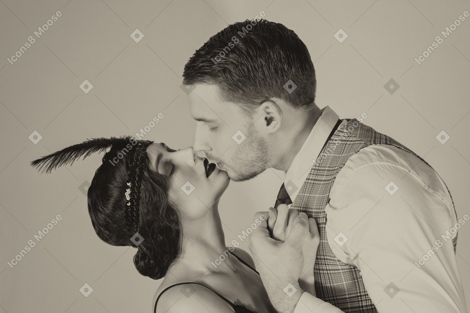 Stylish gentleman kissing his girlfriend