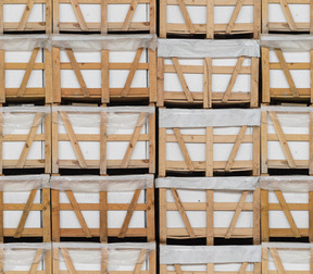 White bricks stored in wooden bins