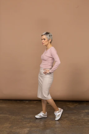 Woman in casual clothes posing in profile