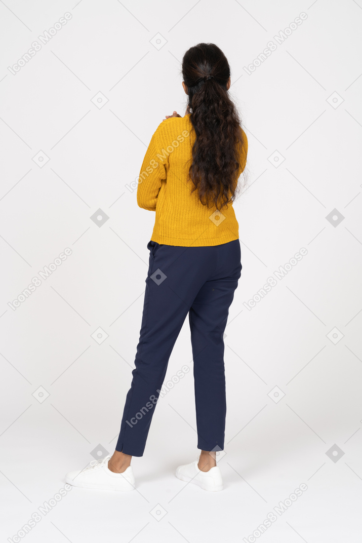 Back view of a girl in casual clothes