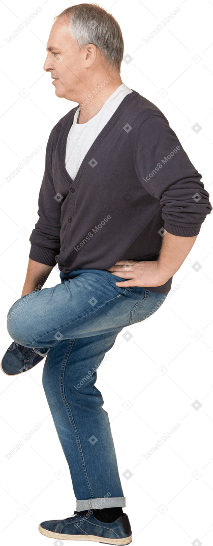 Man in casual clothes posing