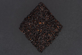 Black rice shaped like a rhombus