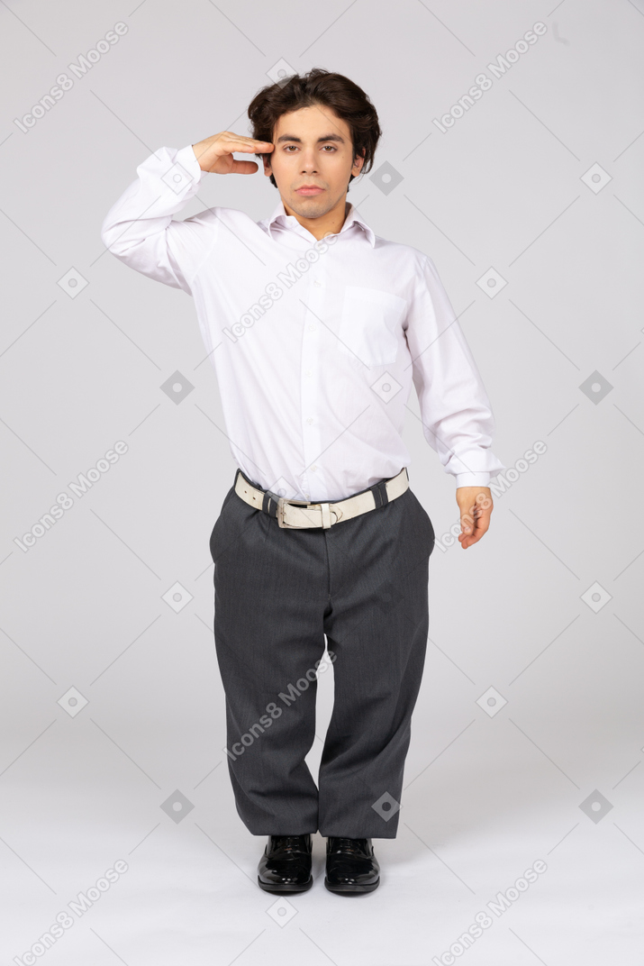 Male office worker giving a salute