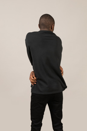 Back view of young man standing