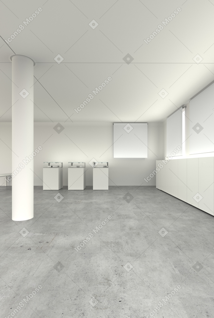 Sala blanca con piso de concreto e impresoras