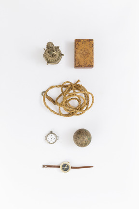 Rope with hook, mini box, mini globe, pocket watch and small statue
