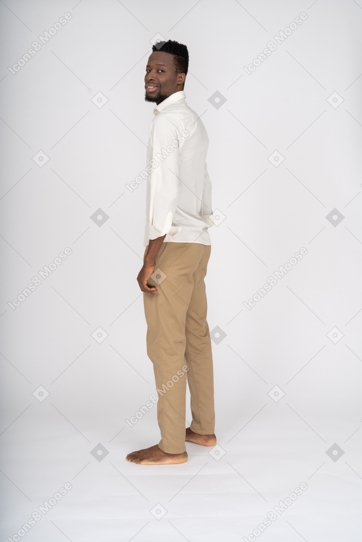 Man in white shirt standing