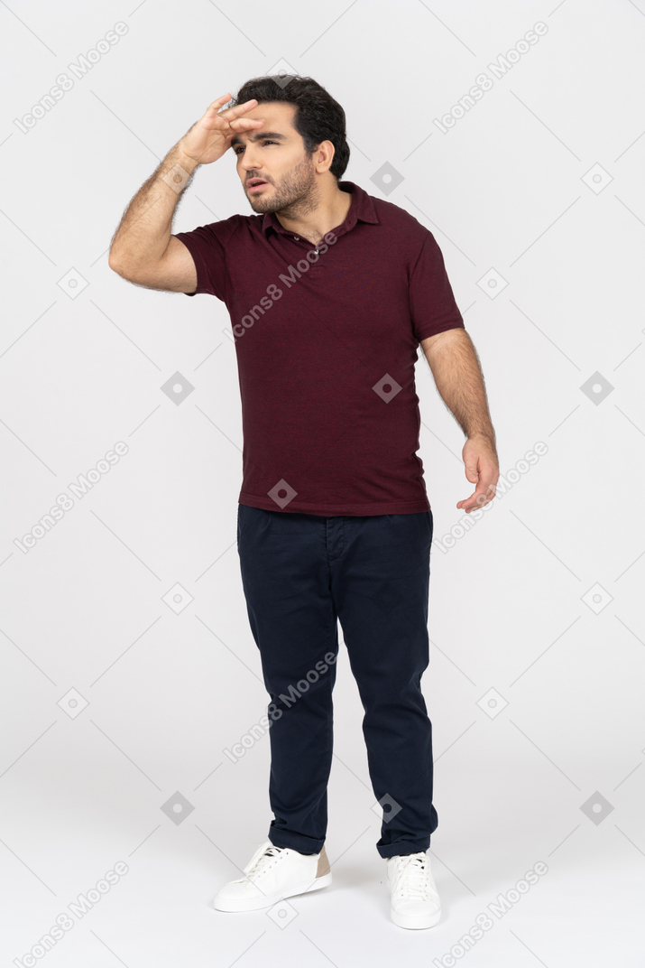 Man in casual clothes looking far ahead