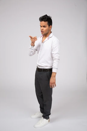 Man in white shirt standing