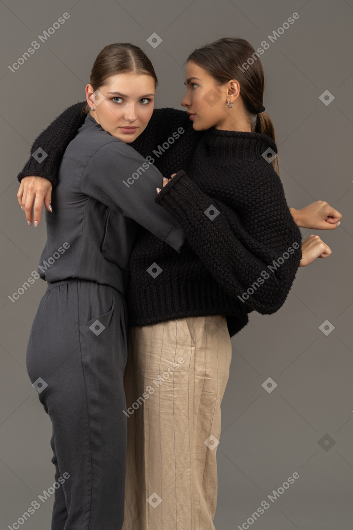 Two women hugging