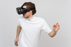 Man in virtual reality headset looking at something